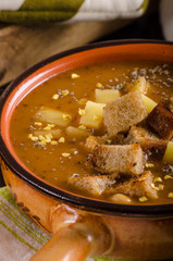 Goulash soup with croutons and potatoes