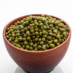 fresh muung beans on a white background