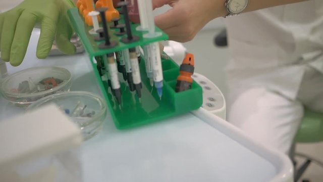 Dentist office preparing for dental composite fillings,doctor and nurse 