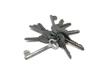 Bunch of old keys isolated on white background.