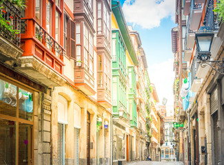 houses of historical downtown of Bilbao, Spain, retro toned - obrazy, fototapety, plakaty