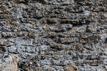 Close up detail of a medieval stone wall, Cotswolds, England