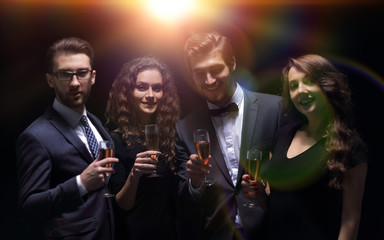 company fashionable friends ,with a glass of wine