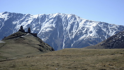 Georgia. Caucasian mountains. Gergeti Trinity Church. Mount Kazbek, Mqinvartsveri, Ossetian, Kazbegi Municipality, Stepantsminda.