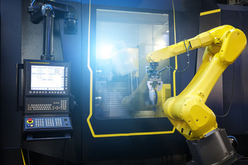 Robot arm motion blur in machine tool metalworking process for industry manufacture,CNC metal machining.