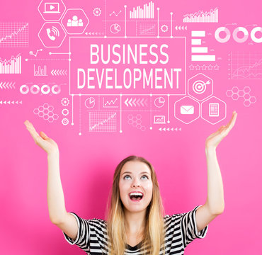 Business Development with young woman reaching and looking upwards