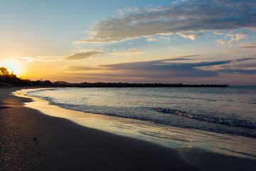 Sunrise on a beach on the meditteranean sea, southern France.