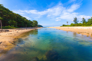 sea water in canal from the sea flow down the sea when low tide at Nai Harn beach Phuket