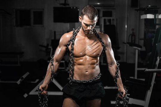 Muscular Man Slave In Chains In Gym, The Prisoner