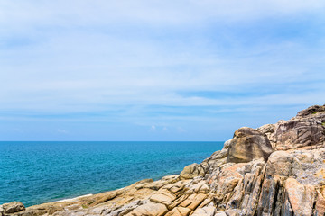 Beautiful natural landscape of rock along the coastline with blue sea under the summer sky at Koh Samui island, Surat Thani province, Thailand