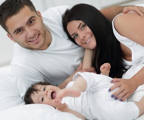 Lovely family morning in the bedroom