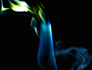 Colored smoke on black background