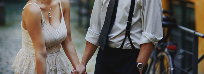 Happy wedding couple having fun