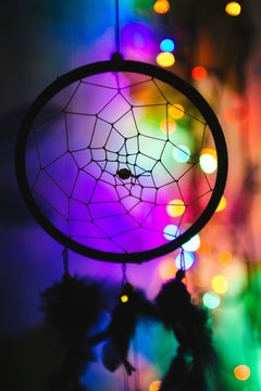 Dreamcatcher on colorful background