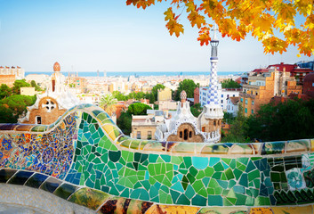 Gaudi bench and cityscape of Barcelona from park Guell, famous view of Barcelona, Spain at fall - obrazy, fototapety, plakaty