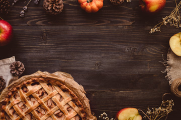 Traditional homemade apple pie on the wooden table with copy space. Top view © fedorovacz