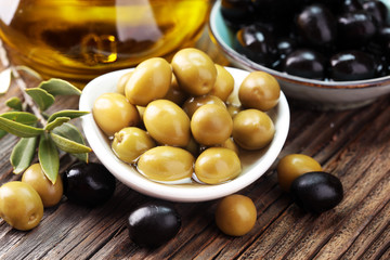 olives and olive oil. fresh organic black and green olives