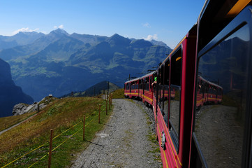 Swiss Alps: The Jungfraujoch train driving down to Wengen and Lauterbrunnen