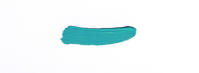 Turquoise brush stroke isolated over white background
