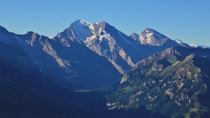 Fototapeta na wymiar Morning scene in the Bernese Oberland. Mount Balmhorn seen from Mount Niesen, Switzerland.