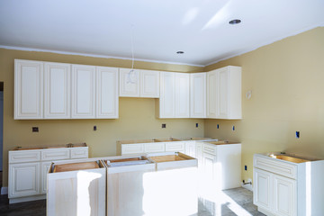 Installing new induction hob in modern kitchen
