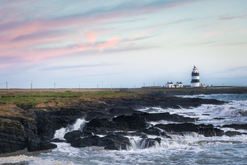 Obraz na płótnie Canvas Hook Lighthouse at Sunset