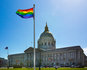 Rainbow flag of LGBT in front of San Francisco City Hall building