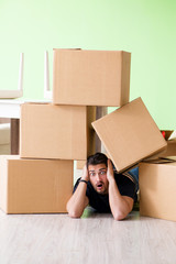 Man moving house with boxes