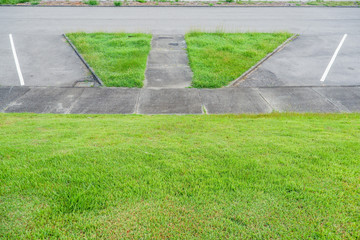 Grass trim around the parking lot for a scenic overlook in the Talladega National Forest in Alabama, USA