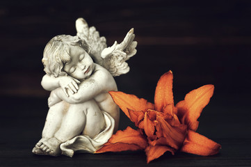 Angel and lily flower