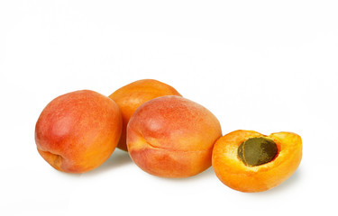 Naklejka na ściany i meble Apricots isolated on white background