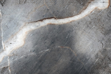 Dark grey marble with scratch natural texture floor and wall pattern and color surface marble and granite stone , material for decoration background texture.