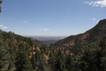 Fototapeta na wymiar Red rocks with desert and mountain landscape in Colorado landscape