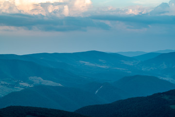 A dramatic sunset viewed from Spruce Knob West Virginia in the Appalachian Mountains looking down on hills in the surrounding valleys