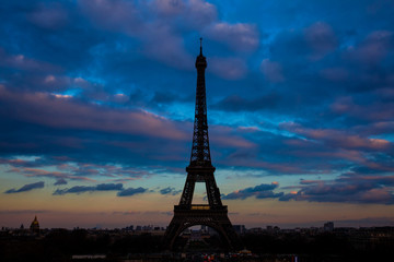 Tour Eiffel the most  famous Parisian icon at sunsent seen from Trocadero in a freezing winter day just before spring