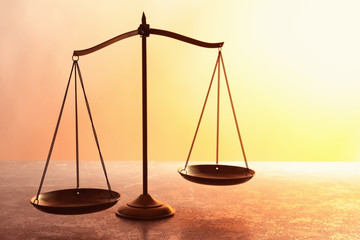 Scales of justice on table. Law concept