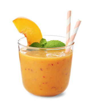 Tasty peach smoothie in glass on white background