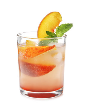 Peach cocktail in glass on white background. Refreshing drink