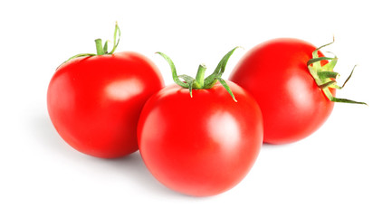 Tasty red tomatoes on white background