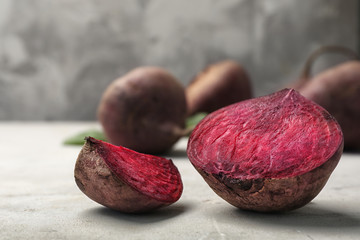 Cut ripe beet on table, close up