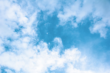Fototapeta na wymiar Vintage blue sky with cloudy background
