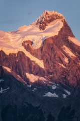 Fototapeta na wymiar Glacier covered peak at sunrise; Torres del Paine NP; Chile