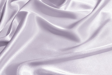The texture of the satin fabric of lilac color for the background 