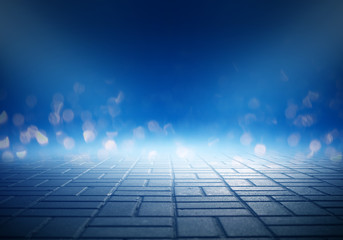 Empty scene of a show with lanterns and concrete floor, blue abstract background with bokeh, lights, rays