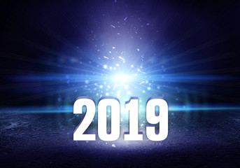 2019 - the symbol of the new year. Abstract background with bokeh, neon light, rays, searchlights. Futuristic sparkling background