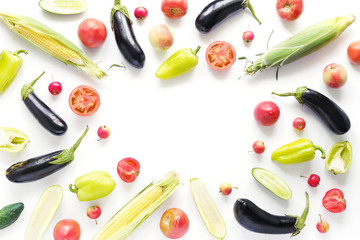 Pattern composition from vegetables top view, flat lay. Food background, wallpaper. Tomatoes, pepper, corn, carrot isolated on white background.