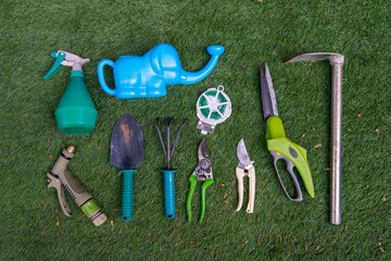 Various gardening tools on the grass