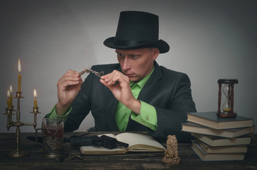 Detective agent collecting a compromising evidence and searching for fingerprint. Detective or spy...