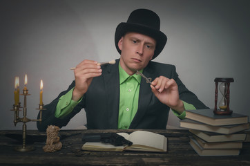 Detective agent collecting a compromising evidence and searching for fingerprint. Detective or spy...
