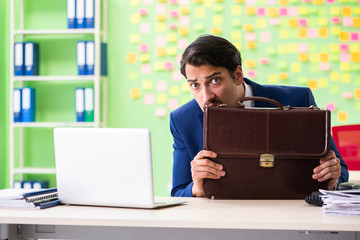 Businessman with many conflicting priorities   